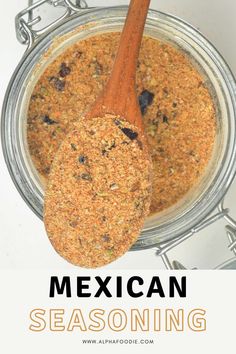 mexican seasoning mix in a glass bowl with a wooden spoon next to it and text overlay