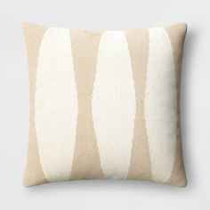 a beige and white striped pillow