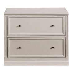 a white dresser with two drawers on each side and one drawer open to show the bottom