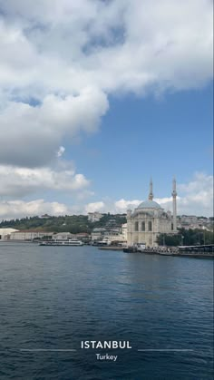 an image of the sea with buildings in the background and cloudy sky above it that reads istaneul turkeyy