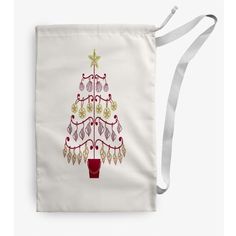 a white bag with a christmas tree on it