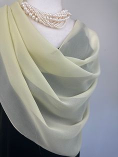 Elevate your style with our exquisite collection of chiffon shawls. Our chiffon shawls are the epitome of elegance and versatility, designed to effortlessly enhance your wardrobe and leave a lasting impression. Made from the fine poly chiffon fabric, these shawls offer a delicate and airy drape that adds a touch of grace to any outfit. Whether you're attending a special occasion, a casual gathering, or simply want to elevate your everyday look, our chiffon shawls are the perfect accessory. Choos Classic Silk Scarf For Weddings, Classic Silk Scarf For Wedding, Elegant Cream Scarf For Formal Occasions, Elegant Silk Scarves For Wedding, Elegant Sheer Dupatta For Formal Occasions, Elegant Silk Chiffon Dupatta For Wedding, Elegant Silk Chiffon Wedding Dupatta, Elegant White Dupatta For Evening, Silk Shawl Scarf For Wedding