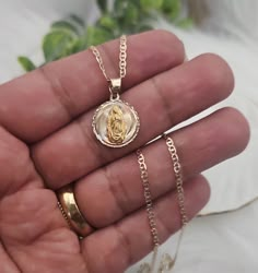 14k Solid Gold Guadalupe Pendant, Small Tricolor Virgin Mary Necklace, 15mm Circular Guadalupe Necklace, 1.5mm Mariner Chain, Stamped 14k Gold, Authentic 14k Gold Necklace  You Can Select: Pendant: NO CHAIN 16" Necklace ( Chain + Pendant) 18" Necklace ( Chain + Pendant Complementary Gift Box E X P E D I T E D ∙ S H I P P I N G You will be able to choose faster shipping options when you add Priority Shipping upon checkout. Ship times do NOT include production times. However, if you select expedit Western Jewelry Necklace, Guadalupe Necklace, Virgin Mary Pendant, Cross Necklace Women, Mary Necklace, Catholic Necklace, Virgin Mary Necklace, Cool Ear Piercings, 16 Necklace