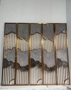 an art deco screen is shown against the wall