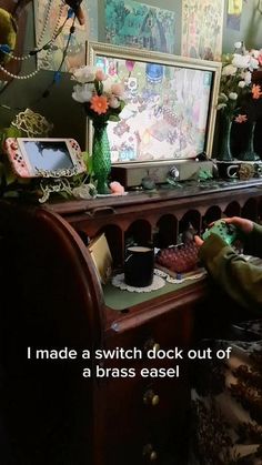 a woman sitting in front of a computer desk