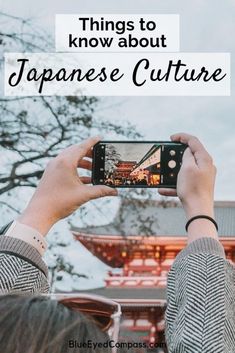 a person taking a photo with their cell phone in front of a building and text that reads things to know about japanese culture