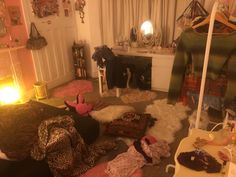 a room filled with lots of clothes and accessories