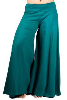 "Palazzo style pant, fitted at waist via elastic, flows out in an A-shape. Stretchy and comfortable. Long inseam and long legged. Looks like a skirt! Free flowing and wonderful to dance in. Pair with one of our crop tops for a classic Mishu style outfit! Approximate measurements: XS: Inseam: 29\" Hip: 34-40\" Waist:28-32\" Length 39\" S: Inseam: 30\" Hip: 36-42\" Waist:30-36\" Length 39\" M: Inseam: 31\" Hip: 38-46\" Waist: 32-40\" Length 39\" L: Inseam: 31\" Hip: 42-48\" Waist: 34-42\" Length 4 Chic Green Full Length Bottoms, Chic Full Length Green Bottoms, Bohemian Full Length Pants For Fall, Green Full-length Bottoms For Fall, Green Full Length Bottoms For Fall, Chic Full-length Relaxed Fit Harem Pants, Bohemian Stretch High-waisted Wide Leg Pants, Loosely Fitted Green Wide Leg Pants For Fall, Cotton Stretch Wide-leg Bottoms