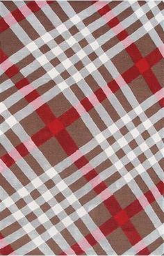 a brown and red plaid fabric with white squares on the bottom, in different colors