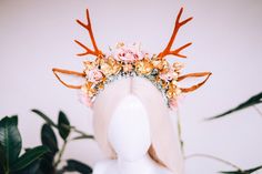 The beautiful glittering Reindeer crown is made of high-quality textile flowers and glittered leaves. The crown will be a great accessory for a Christmas party, Christmas dinner, winter wedding, Christmas photo shoot, New Year celebrations or any important event. This crown was made for the goddess that you are. :) Crowns from our studio are artworks, each piece is original made with love and passion. You can find more crowns in our shop: www.carbickovacrowns.etsy.com You can start following us Reindeer Crown, Dinner Winter, Black Flower Crown, Pine Cone Wedding, Antler Crown, Halloween Crown, Textile Flowers, White Flower Crown, Pink Flower Crown