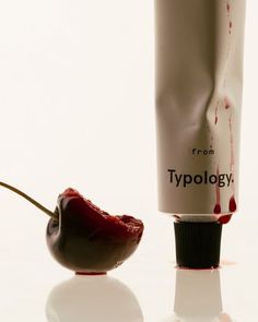 a tube of typology next to a spoon with blood on it