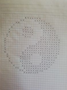 the cross stitch pattern is drawn on top of a piece of paper