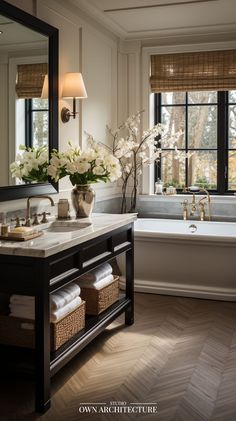 a bathroom with a sink, mirror and tub in it's centerpieces