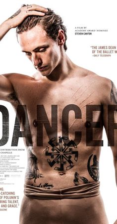 a man with tattoos on his chest standing in front of a white background that says danger