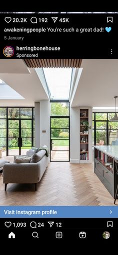 an open living room and dining area with windows