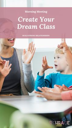 a woman and two children sitting at a table with their hands in the air