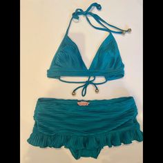 Nwot Vintage Bikini! Tried On But Never Worn, I Really Wanted This To Work For Me... But It Didn’t And I Found It In My Closet! Super Soft With Pleating Detail. The Bottoms Have A Skirt With A Ruffle Hem. Top Has Ties With Gold Metal Ball Detail On Ties. 92% Polyester 8% Spandex Siren Bathing Suit, 2000s Bikinis Vintage, 70s Bikinis Vintage, Turquoise Fitted Tankini For Poolside, Fitted Turquoise Tankini For Poolside, Turquoise Fitted Halter Neck Swimwear, Fitted Triangle Top Tankini For Pool, Fitted Turquoise Swimwear For Beachwear, Fitted Tankini With Tie-side Bottom For Pool