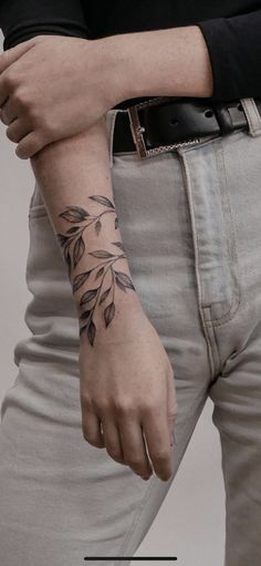 a person with a tattoo on their arm