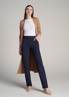 About Our Slacks for Tall Women The search for extra-long women's dress pants is over. Whether you're meeting clients to close a deal or walking into a big job interview, you need an outfit that's going to make you look good and feel confident. Finding options when you're vertically blessed can be tough, which is why we designed this pair of slacks for tall women between 5'9” and 6'6”. They have an extra-long inseam with a turn-up hem, a slim straight fit that will flatter your long legs and a h Office Pants For Women, Tall Girl Dresses, Pants For Tall Women, Slacks Outfit, Tall Lady, Dress Body Type, Tall Women Fashion, Dress Pants Outfits, Scrubs Dress