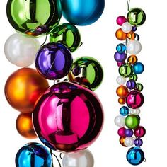 an assortment of christmas ornaments hanging from strings