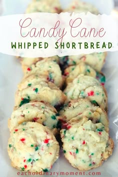 candy cane whipped shortbread cookies on a white plate with the words, candy cane whipped shortbread