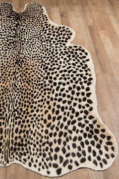 an animal print rug is shown on the floor