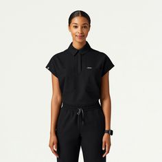 Acta Oversize Scrub Top in Black is a contemporary addition to women's medical outfits. Shop Jaanuu for scrubs, lab coats and other medical apparel. Traveling Nurse, 2023 Outfits, Iv Therapy, Scrub Sets, Medical Scrubs, Chic Top, Tonga, Scrub Pants, Sierra Leone