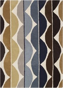 a multicolored rug with wavy lines on it