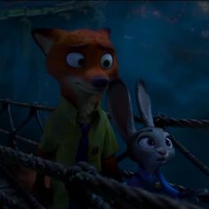 the fox and the rabbit are standing next to each other in a scene from disney's animated movie