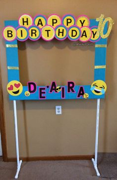 a sign that says happy birthday with smiley faces on it and the words deara written in