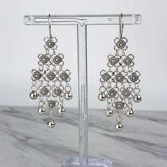 Handmade 925 Sterling Silver Artisan Crafted Filigree Ornate Floral Chandelier Earrings Matching pendant is available https://www.etsy.com/listing/1026833689/925-sterling-silver-chandelier-pendant?ref=listings_manager_grid Material: 925 Solid Sterling Silver Earrings Length: 2.50 inches Width: 0.90 inches Closure: Ear wire with safety catch Finishing: Oxidized and Polished Comes with a gift pouch and box Free Domestic Shipping We hope that you enjoy our exclusive artisan handcrafted jewelry. Ornate Ring, Earrings Matching, Silver Chandelier Earrings, Silver Chandelier, Floral Chandelier, Yellow Gemstones, Chandelier Pendant, Earrings Women, Gift Pouch