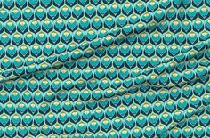 a blue and green fabric with an abstract design on the front, in shades of teal