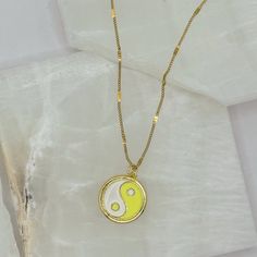 18K gold, brass pendant free of lead and nickel set with cubic zirconia, coated with enamel. 18K gold, stainless steel chain. pendant dimensions: diameter: 18mm Yin Yang Necklace, Brass Pendant, Gold Brass, Chain Pendant, Steel Chain, Stainless Steel Chain, Yin Yang, Cubic Zirconia, 18k Gold