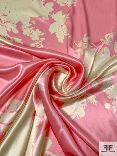 a pink and white floral print fabric