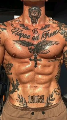 a man with many tattoos on his chest