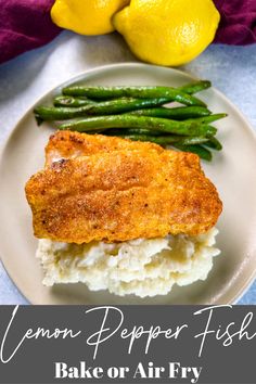 lemon pepper fish baked or air fry on a plate with mashed potatoes and asparagus