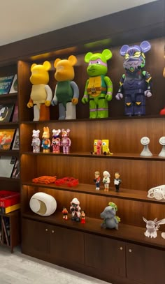 there are many toys on the shelves in this room