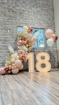 balloons and lights are arranged in the shape of numbers