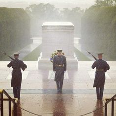 This is an amazing picture of the honor guard at the Tomb of the Unknown Soldier. Despite the hurricane, they are on duty. God Bless these men Tomb Of The Unknown Soldier, Arlington Virginia, Unknown Soldier, Honor Guard, Arlington National Cemetery, National Cemetery, Home Of The Brave, Us Soldiers, Military Heroes