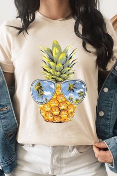 Summer Pineapple Graphic T Shirt.Unisex, Crew Neck, Short Sleeve Tee. 100% COTTON HEATHER(52%COTTON,48%POLY) ATH.HEATHER,BLACK HEATHER(90%COTTON,10%POLY) Imported Pineapple Graphic, Summer Pineapple, Holiday Graphic Tees, Patriotic Tees, Pineapple Design, Concert Festival, Film Prints, Sleep And Loungewear, Birthday Party Gift