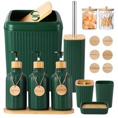 green bathroom accessories including soap dispenser, toothbrush holder and cups