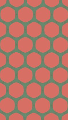 an orange and green background with small hexagonals in the shape of circles