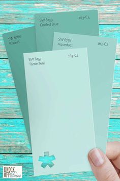 three shades of blue and green with the same color for each paint swatch on them