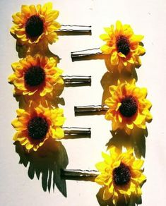 five sunflowers are arranged in the shape of a number