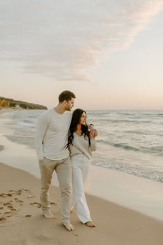 Lake Michigan Beach engagement photos, Michigan wedding photographer, sunset engagement photos on the beach, Lake Michigan photoshoot, West Michigan photographer, candid engagement photos, engagement photo poses, engagement photo inspiration, neutral casual engagement photo outfits Pre Wedding Photoshoot Beach, Michigan Engagement Photos, Photoshoot At The Beach, Engagement Photos Lake, Beach Photoshoot Ideas, Photo Shoot Beach