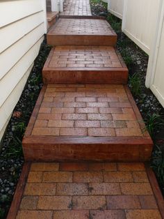 brick steps leading up to a white house