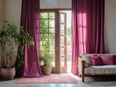 a living room filled with furniture and a large window covered in pink drapes next to a potted plant