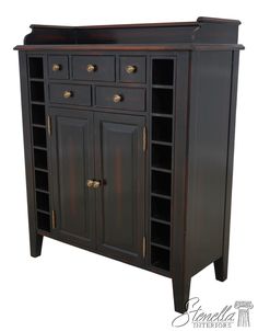 a wooden cabinet with two doors and drawers