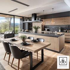 a modern kitchen and dining area with wood flooring, black counter tops and chairs