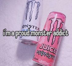 two cans of juice with the words i'm a proud monster addict